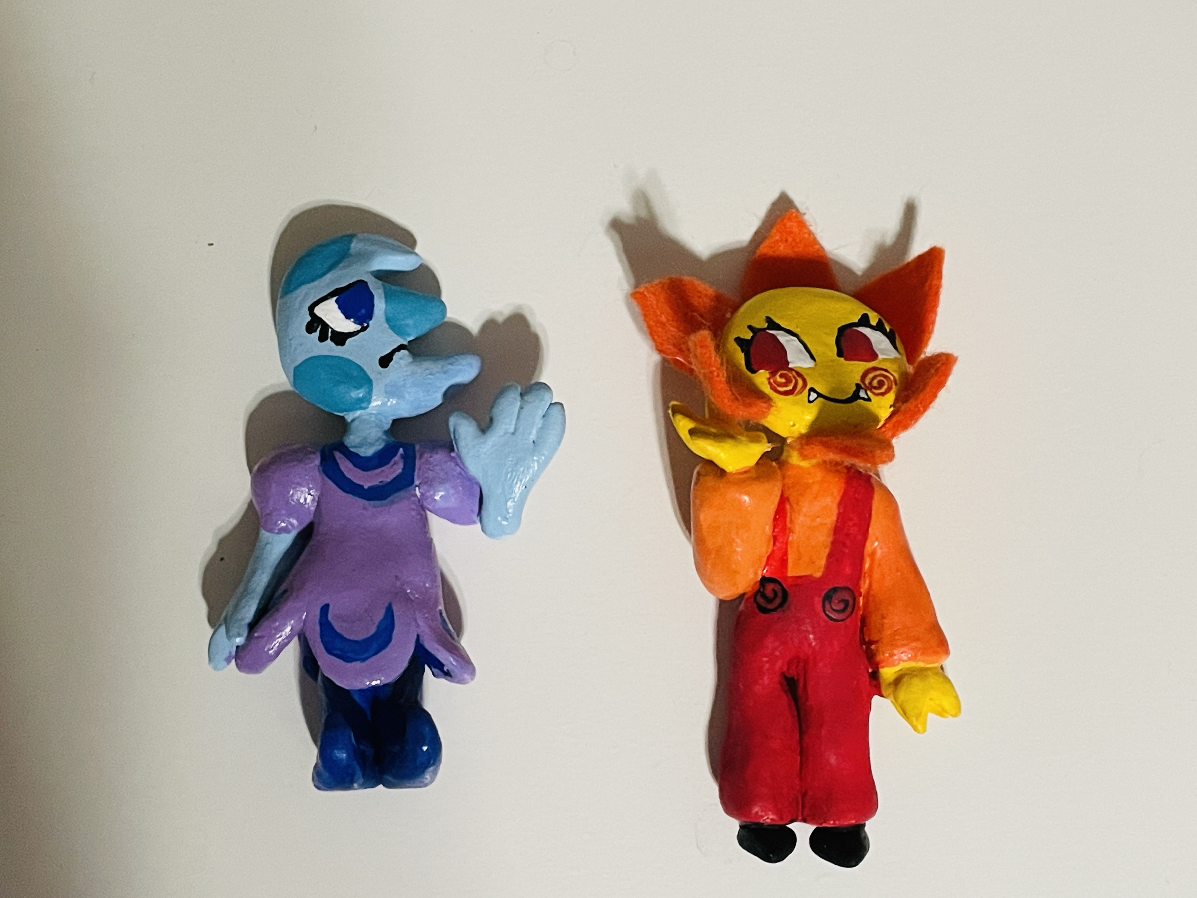 Sculpted figures.